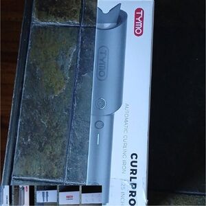 Tymo Automatic Curling Iron.       C